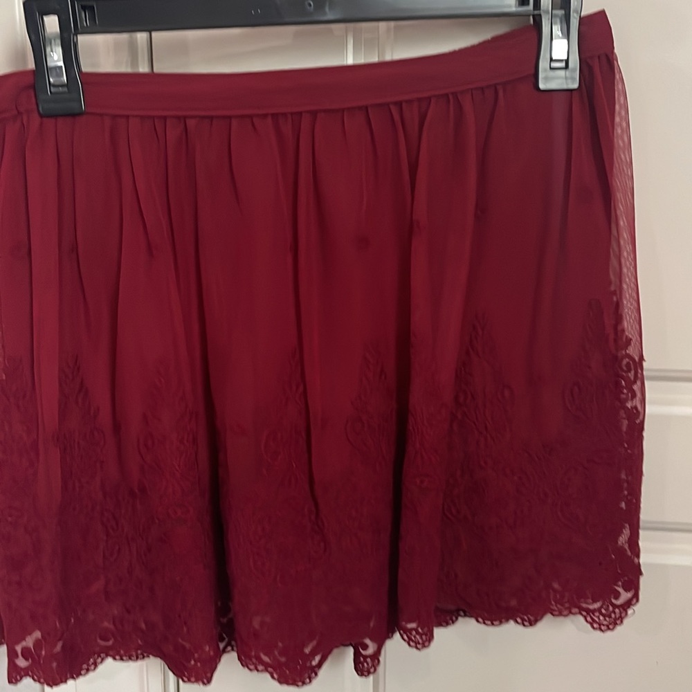 Red Lacy Hollister skirt size M. $7